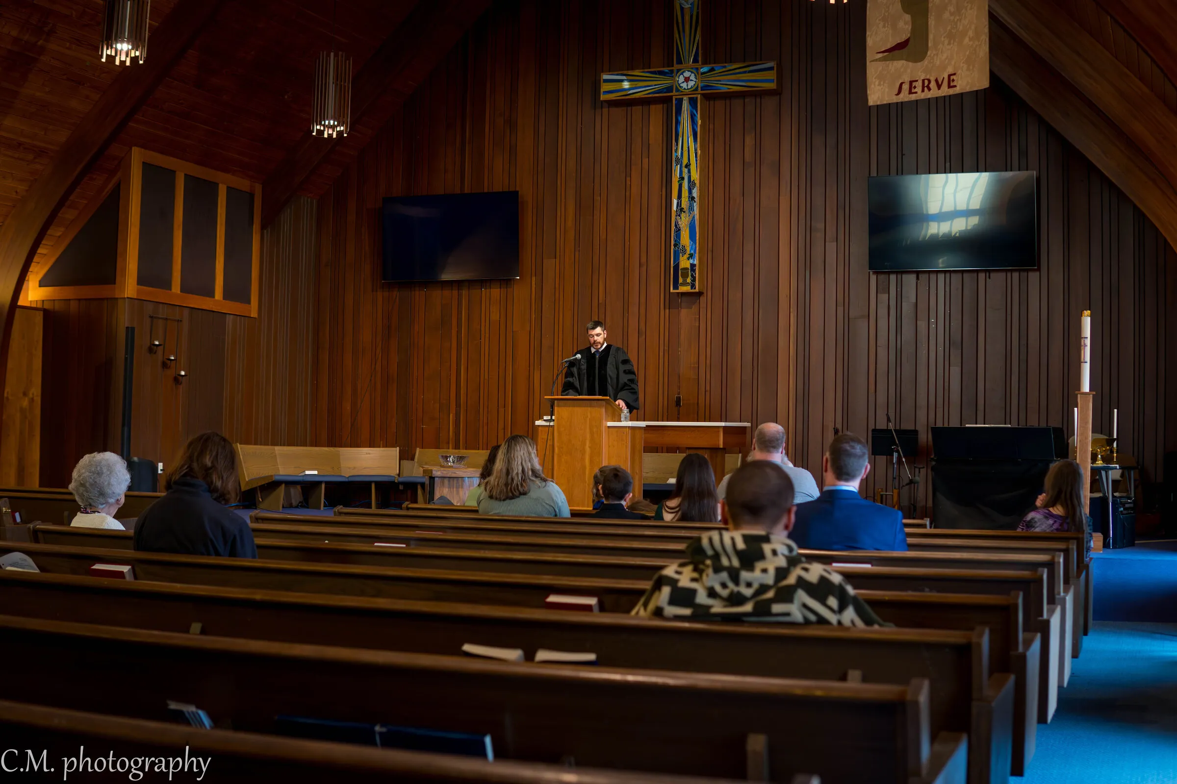 The congregation listening to the sermon