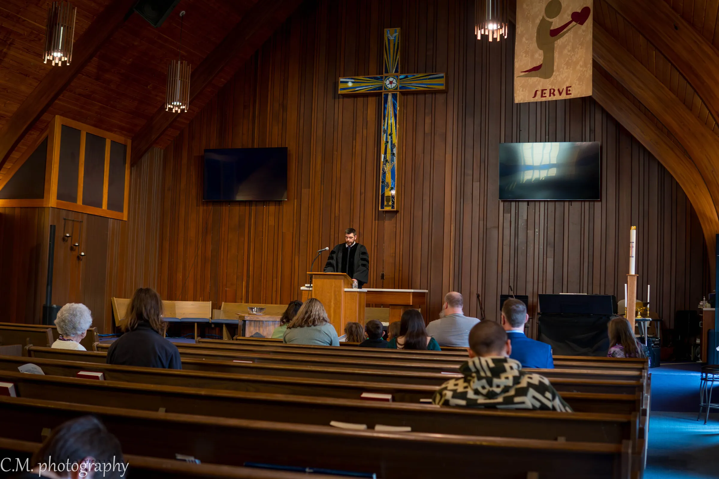 The pastor preaching to the congregation