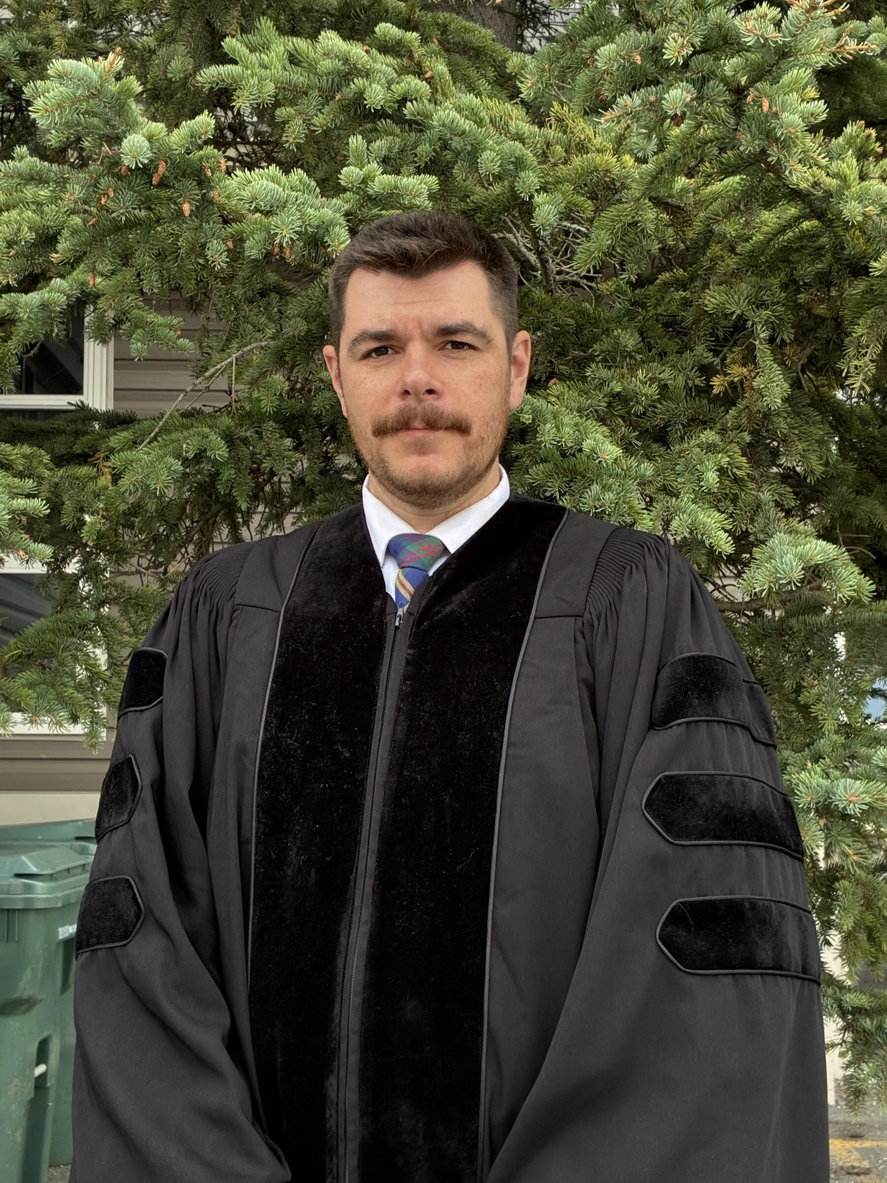 Pastor Joe Váradi of Redeemer URC in his robe